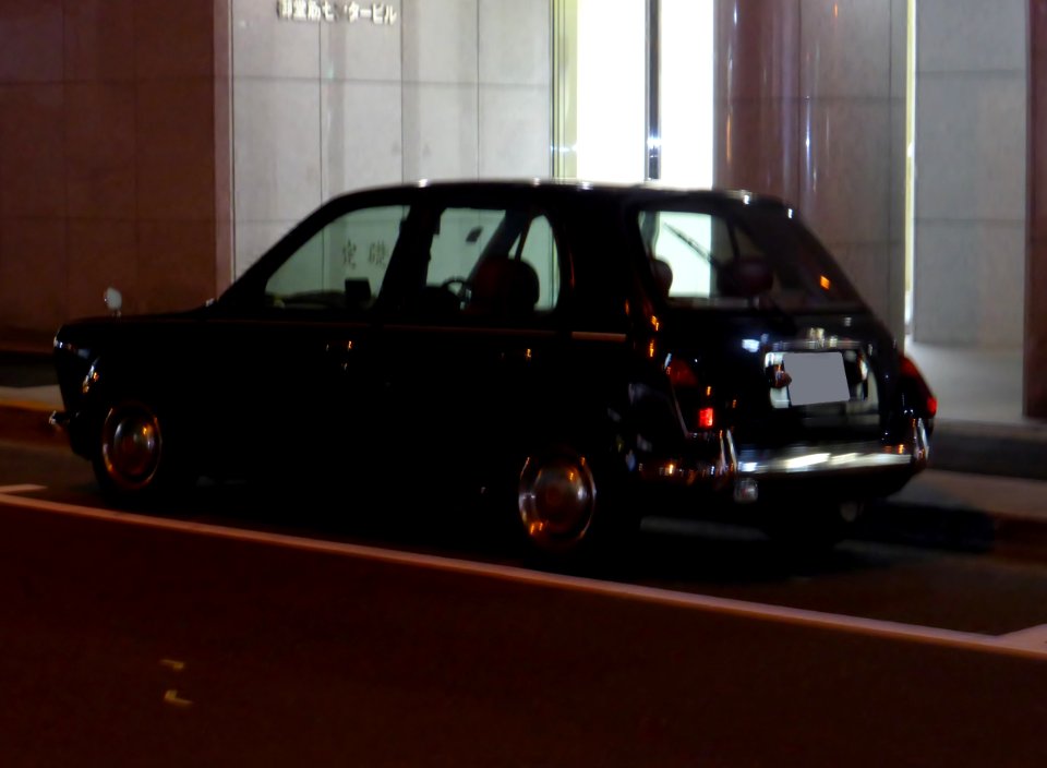Nissan MARCH mooku Princess (K11) at night rear