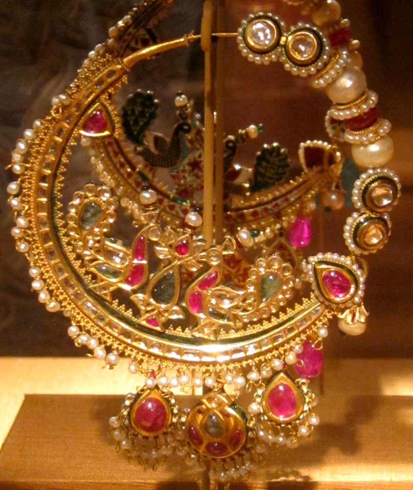 Nose ring, northern India, early 20th century, gold, rubies, emeralds, diamonds, pearls and enamel, HAA