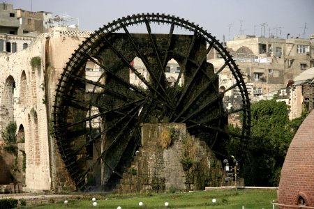 Noria and houses in Hama, Syria
