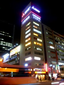 Neon sign of MITSUBISHI ELECTRIC CORPORATION at Umeda at night photo