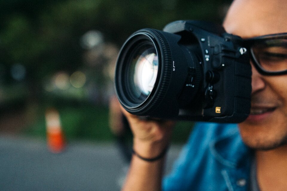 Macro photographer taking photo