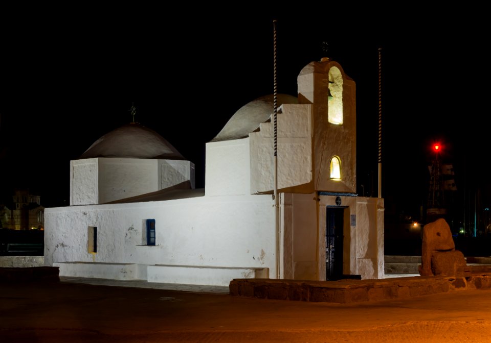 Night view chapel harbour Aegina Greece