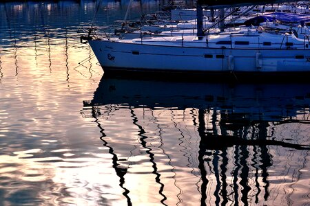 Dawn reflection boat photo