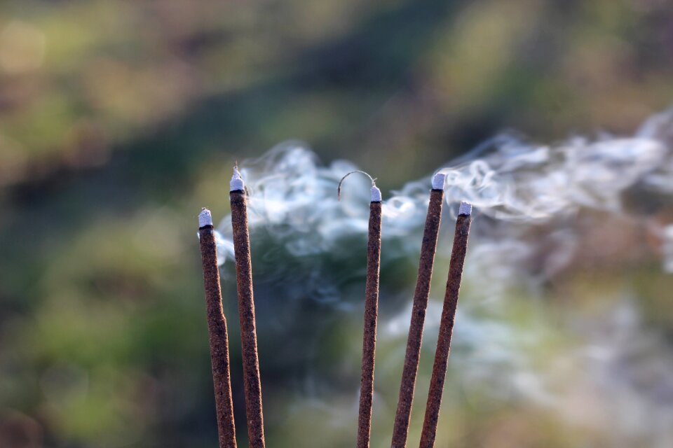 Blow incense sticks photo