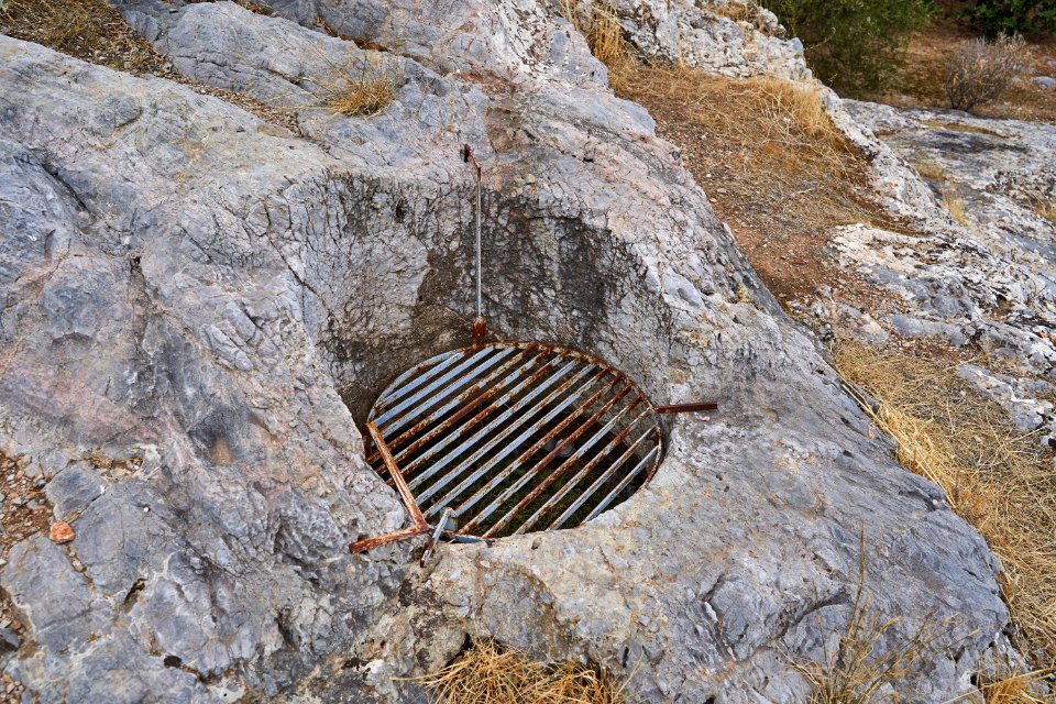 One of the rock-cut cisterns on the Pnyx, 19 September 2020