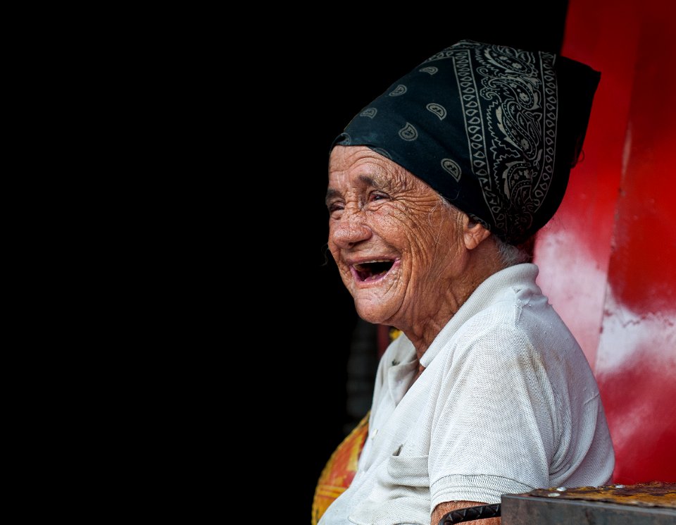 Old Woman Laughing on the Market