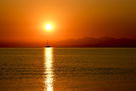 Sea sun sunset photo
