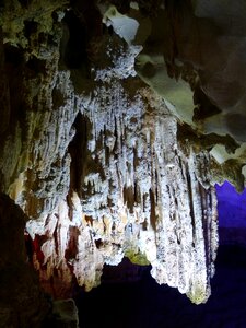 Stalagmites lighting grotto