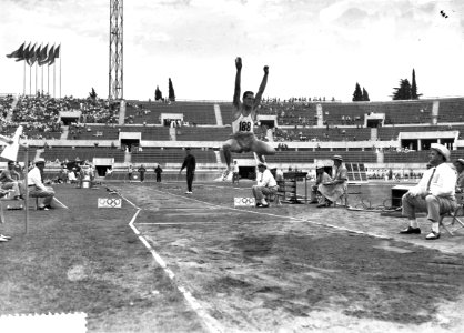 Olympische Spelen te Rome, Eef Kamerbeek tijdens verspringen, Bestanddeelnr 911-5861