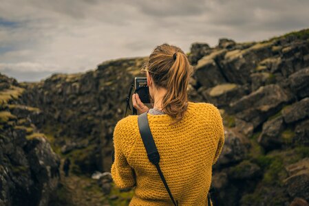 Rocky taking photo woman