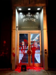Oakland Police Department door vandalized