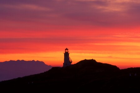 Silhouettes mountains coast photo