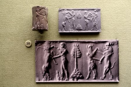Nude bearded hero wrestling with water buffalo, bull man fighting lion, Mesopotamia, Akkadian period, c. 2334-2154 BC, serpentine cylinder seal - Morgan Library & Museum - New York City - DSC06594
