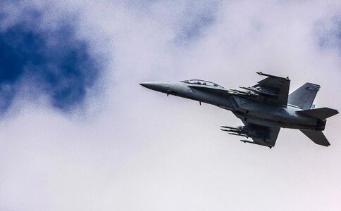 Clouds fast fighter jet photo