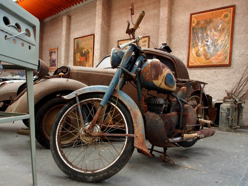 Old blue and white motorcycle of the Association Lorraine des Amateurs dAutomobiles