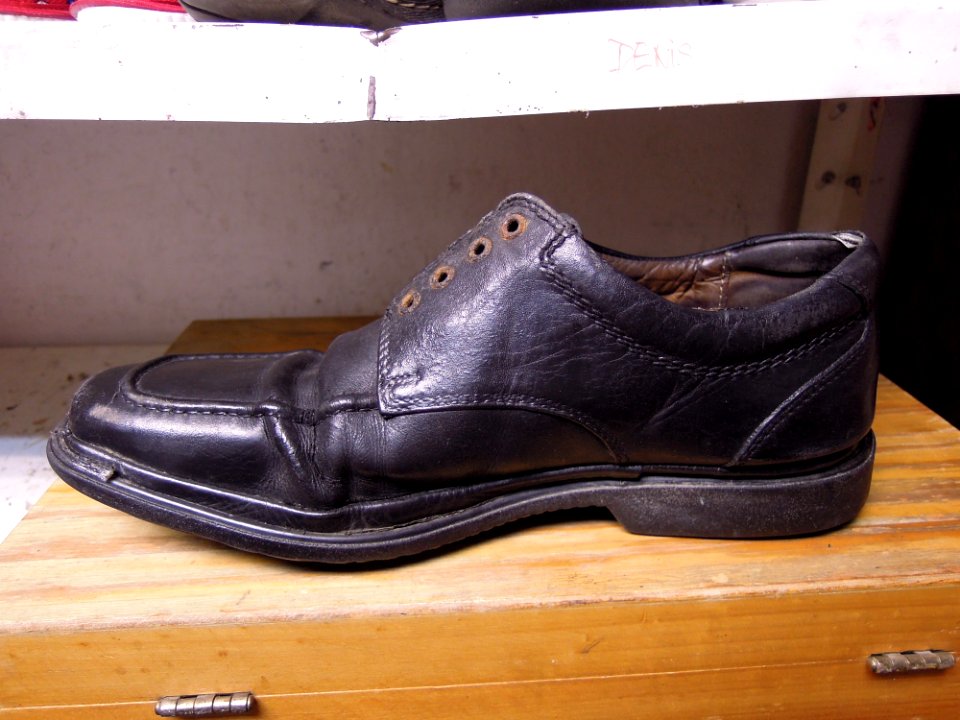 Old black male shoe 01
