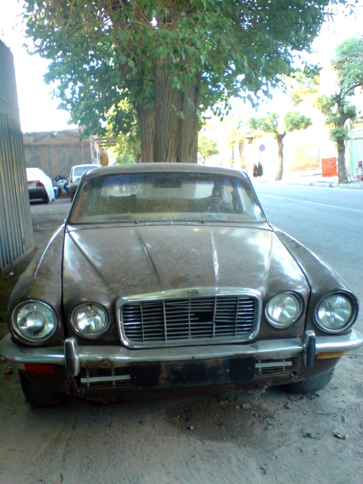 Old brown Jaguar vehicles in Nishapur-Modarres St, (7)