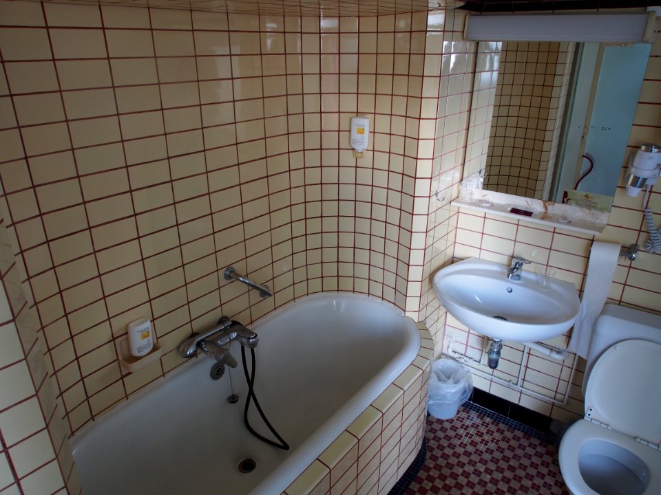 Old bathroom with subway tiles