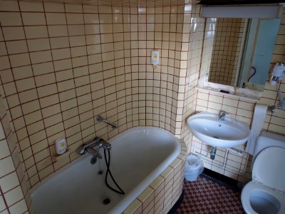 Old bathroom with subway tiles