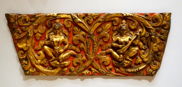 Nymphs (apsaras) playing instruments, Bhutan, 18th century AD, embossed gilt copper sheet, painted red - Ethnological Museum, Berlin - DSC01893