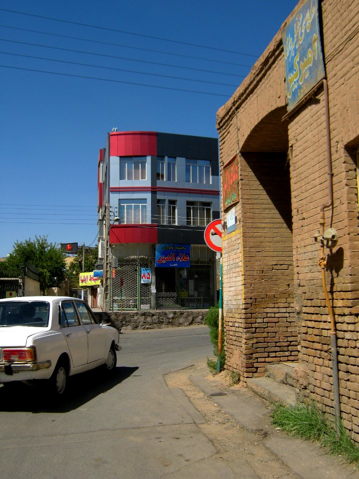 Old brick made house and new aluminium front building - Manuchehri st - Peykan- Nishapur 3