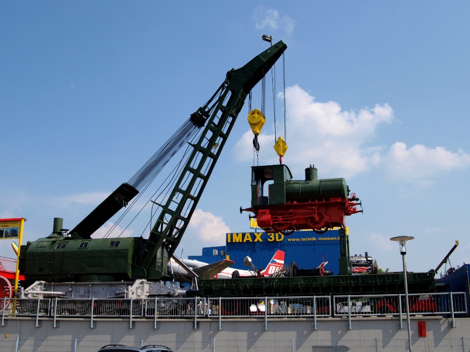 Old lock hanging on crane at Sinsheim p4