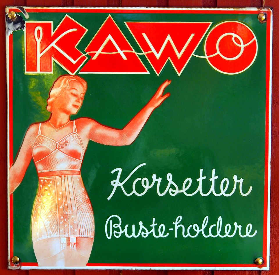 Old Danish enamel advertising sign, KAWO Korsetter (green)