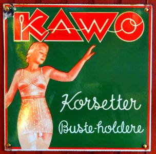 Old Danish enamel advertising sign, KAWO Korsetter (green)