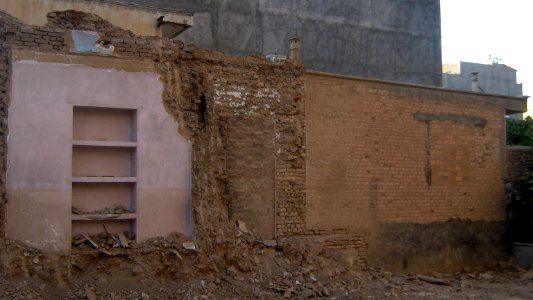 Old house destroyed near 9 floor apartment under construction - Daraei ave - Nishapur - at morning 01