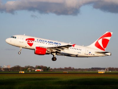 OK-MEL Czech Airlines (CSA) Airbus A319-112 - cn 3094 takeoff from Polderbaan, Schiphol (AMS - EHAM) at sunset, pic2 photo