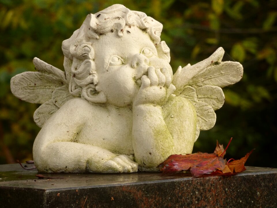 Cemetery angel figure stone