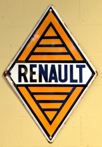 Orange Renault enamel advert sign at the den hartog ford museum pic-029