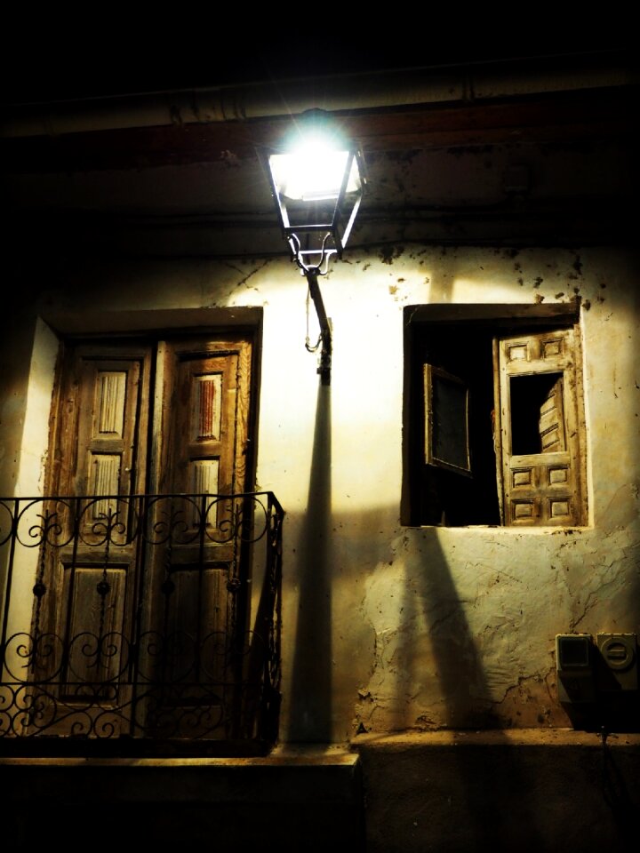 Old house street lamp facade