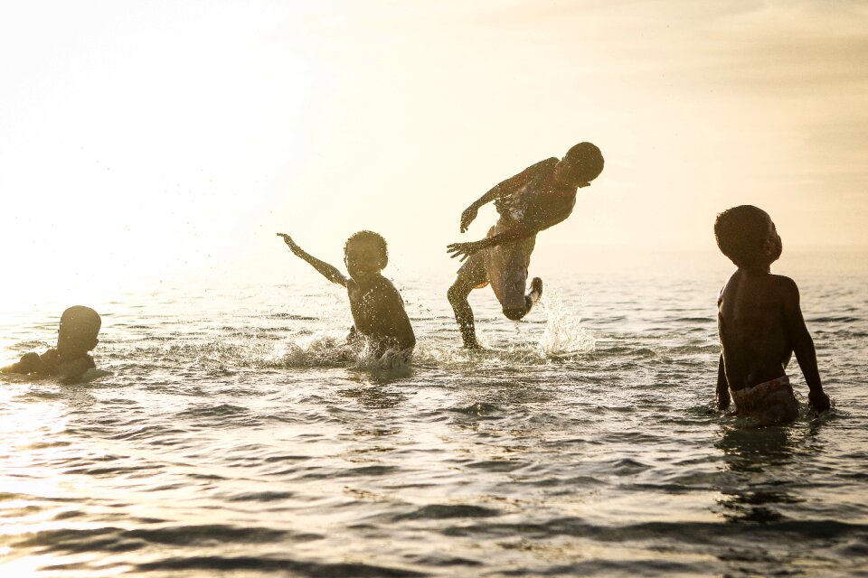 Ocean people playing