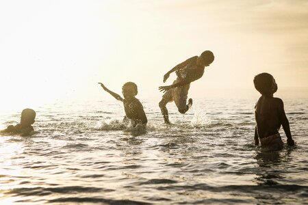 Ocean people playing
