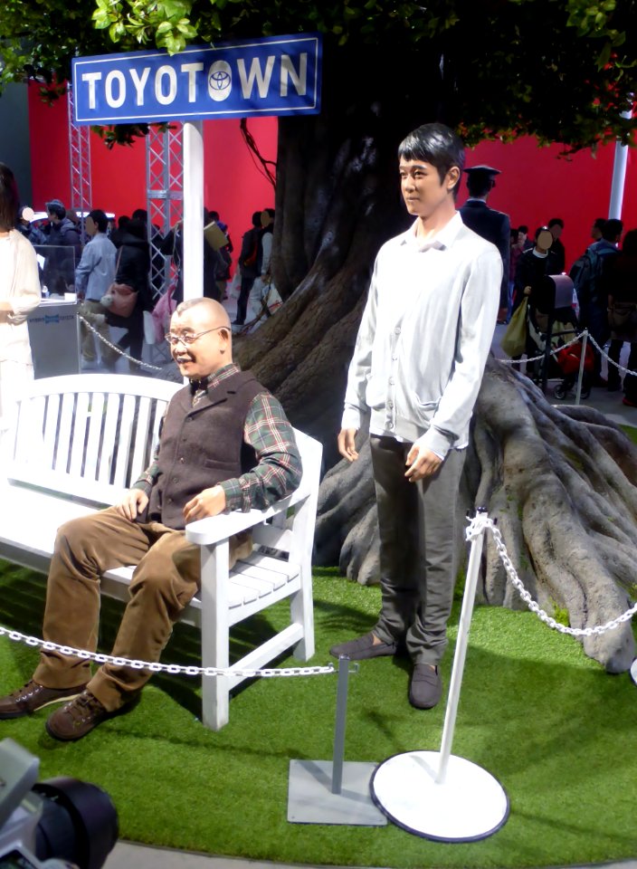 Osaka Motor Show 2013 (65) TOYOTOWN the statue of the secret man & the man who lives for a long time in TOYOTOWN, not HANZAWA Shinnosuke and Naoki