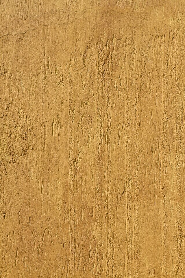 Plastering wall yellow