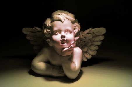 Trim melancholy statue