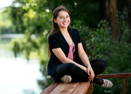 The sitting pose smile teeth