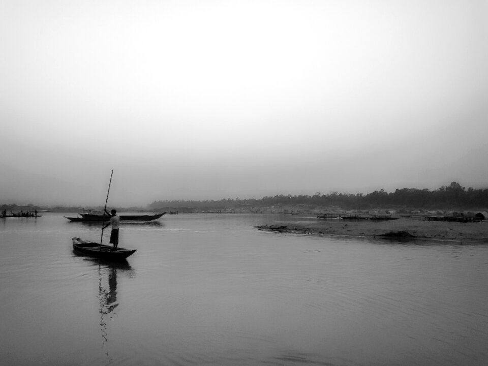 Afternoon gray river gray boat