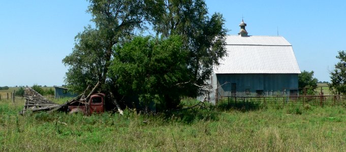 Pavelka farmstead barn and sheds from E