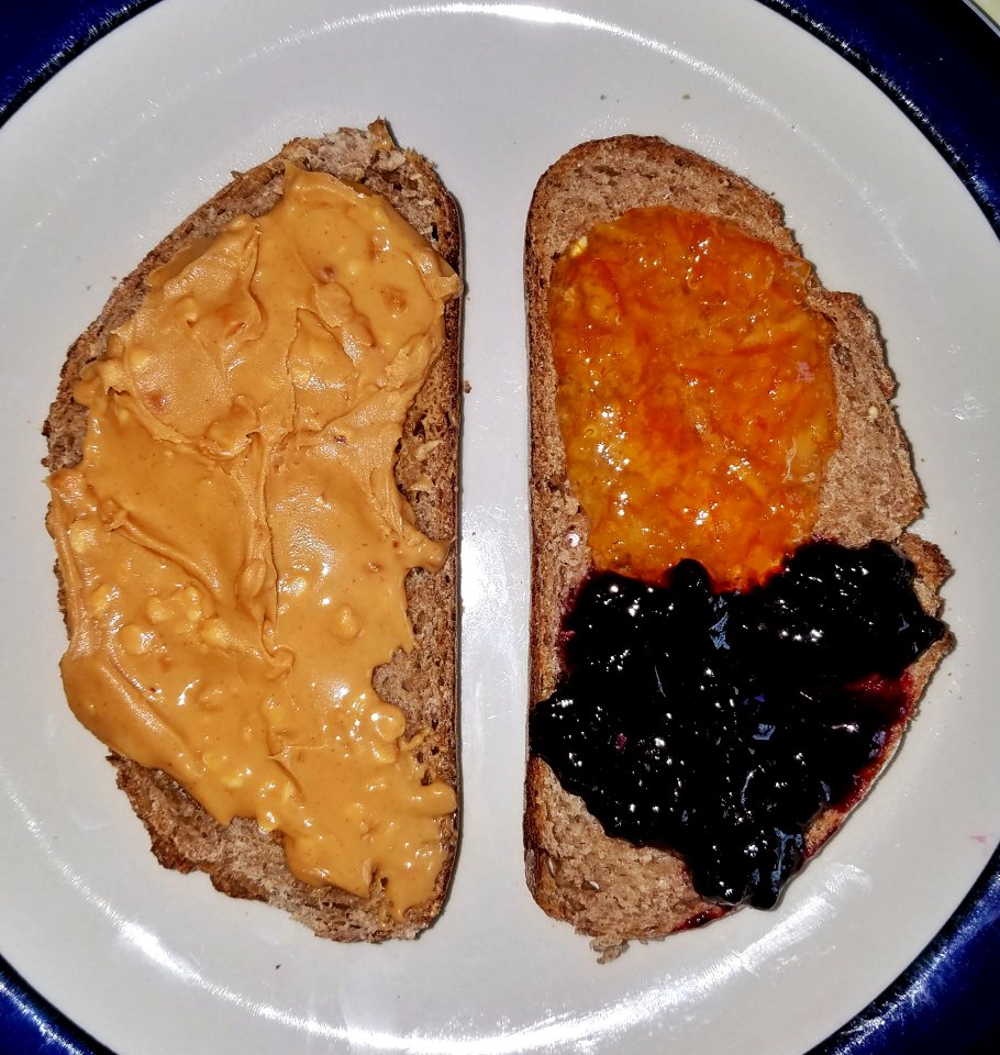 Peanut butter, marmalade, and blackberry jam on toasted German rye bread - Massachusetts