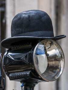 Hat vintage black headlight of an old car photo