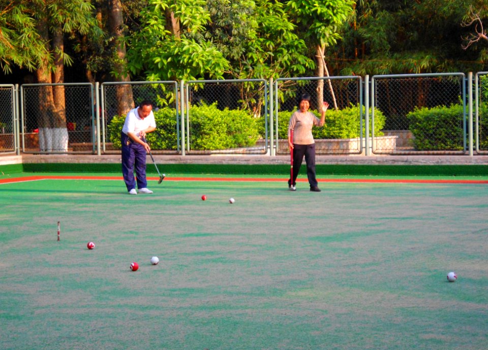 People playing gateball or a variant in Haikou People's Park - 02
