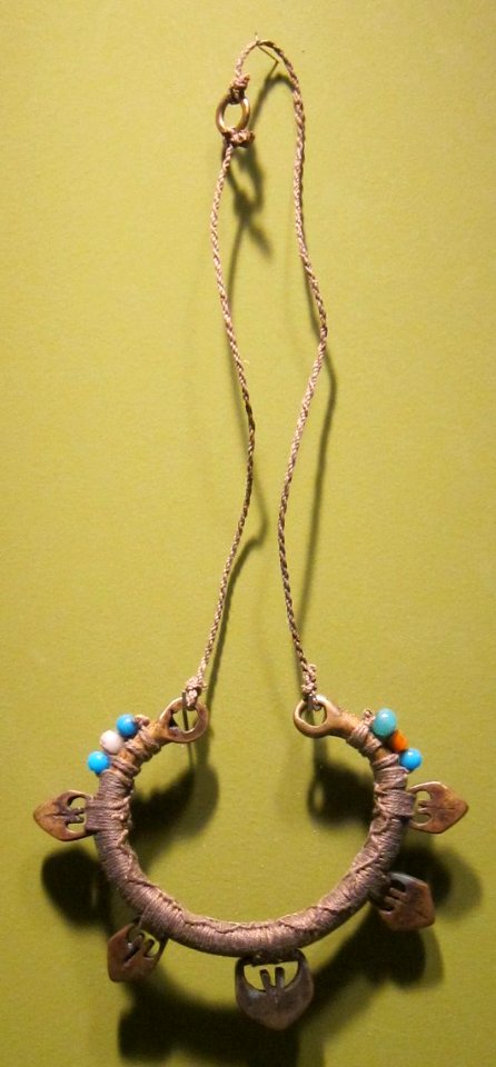 Pectoral, Northern Luzon, Ifugao, brass, thread and glass beads, Honolulu Museum of Art