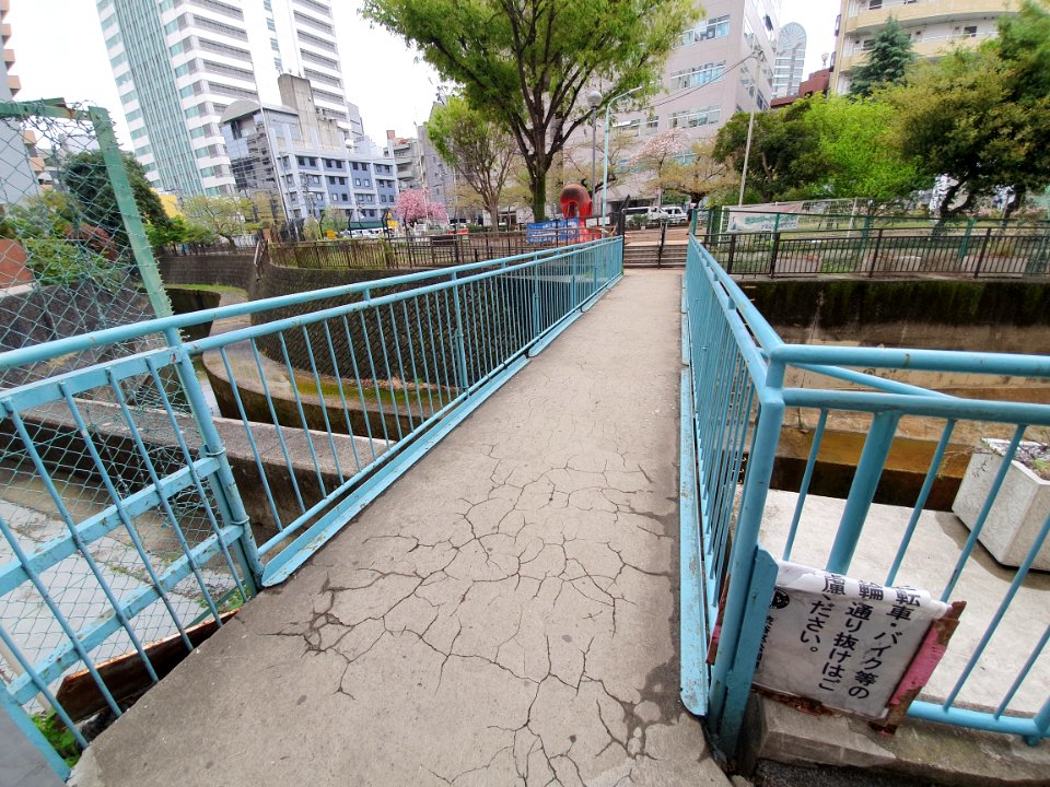 Pedestrian bridge over Shibuya River in Ebisu