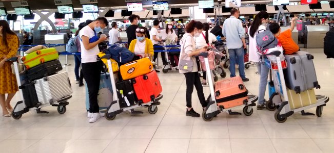 Passengers waiting for a flight to Shanghai in March 2020 photo