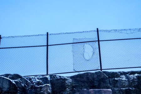 Patched wire fence photo