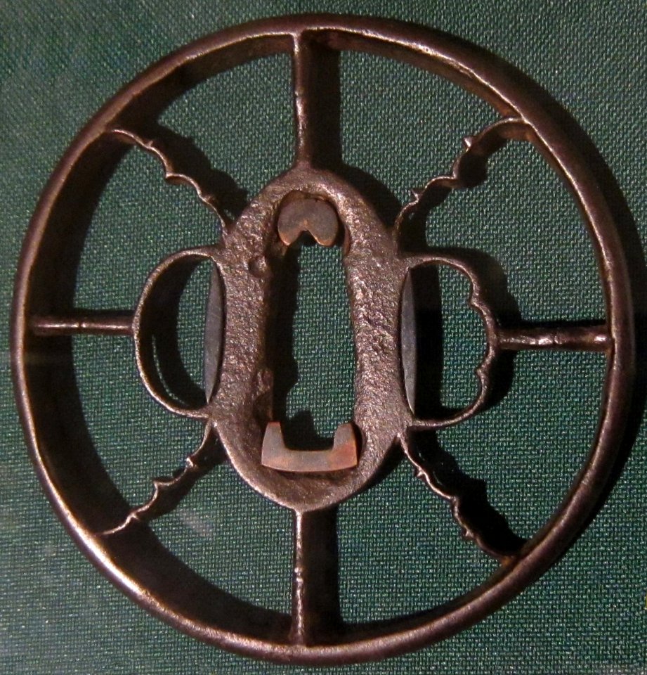 Owari openwork sword guard with stylized geese and bamboo, 15th century, iron