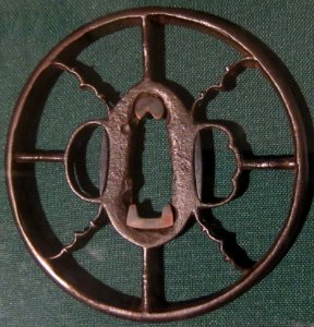 Owari openwork sword guard with stylized geese and bamboo, 15th century, iron